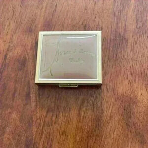 Vintage jewelry travel caddy with mirror.